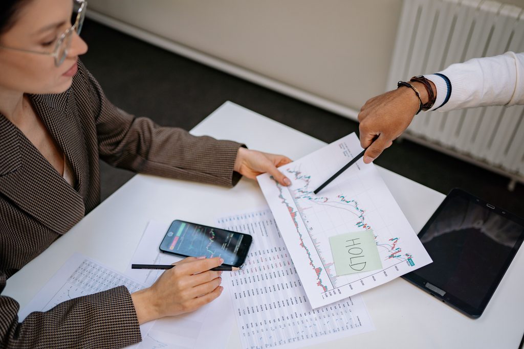 woman looking at an investment chart